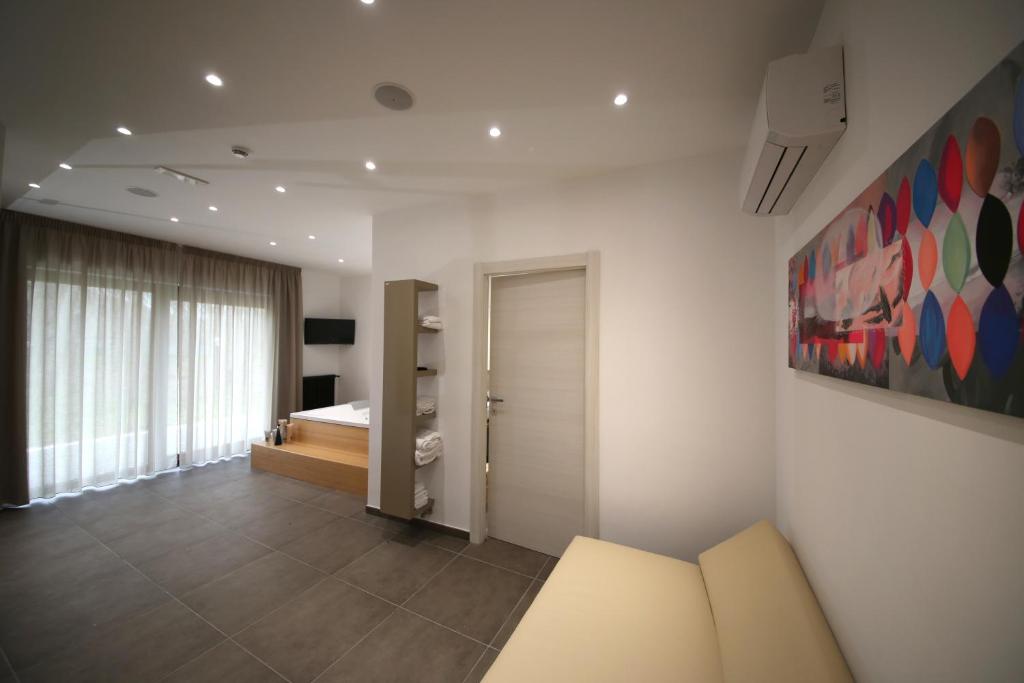 Postel nebo postele na pokoji v ubytování Aminta Resort