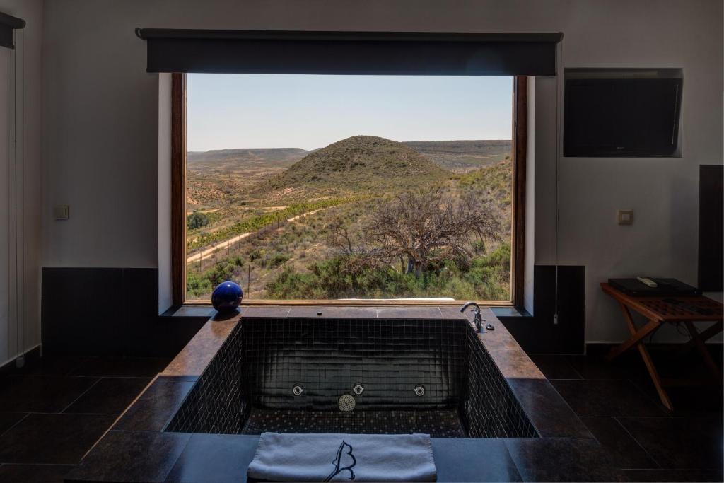 La Almendra y El Gitano - Jacuzzi privado en la habitación en Agua Amarga