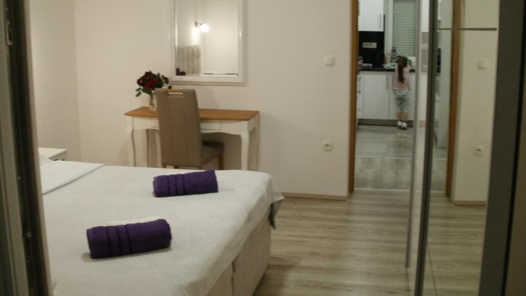 Postel nebo postele na pokoji v ubytování Apartment Nino
