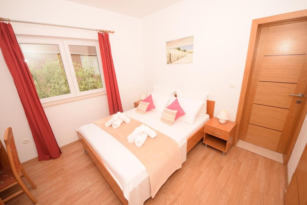Posteľ alebo postele v izbe v ubytovaní Apartments Ćurković (Orebić - Dalmatia)