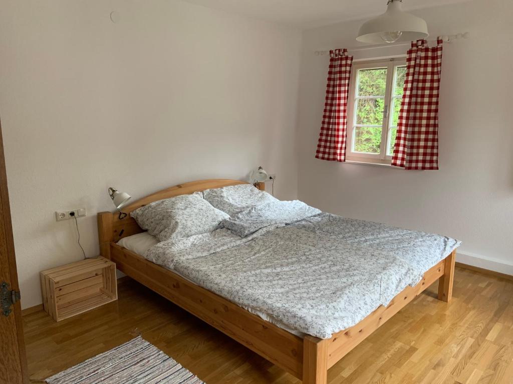 Una cama o camas en una habitación de Villgratenhaus