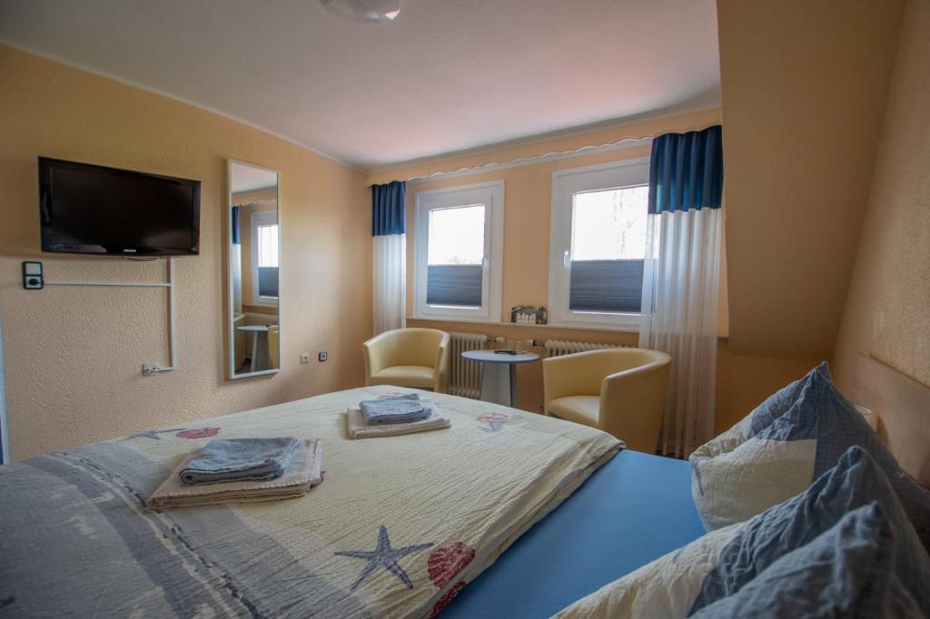 TV a/nebo společenská místnost v ubytování Hotel Norden Norddeich