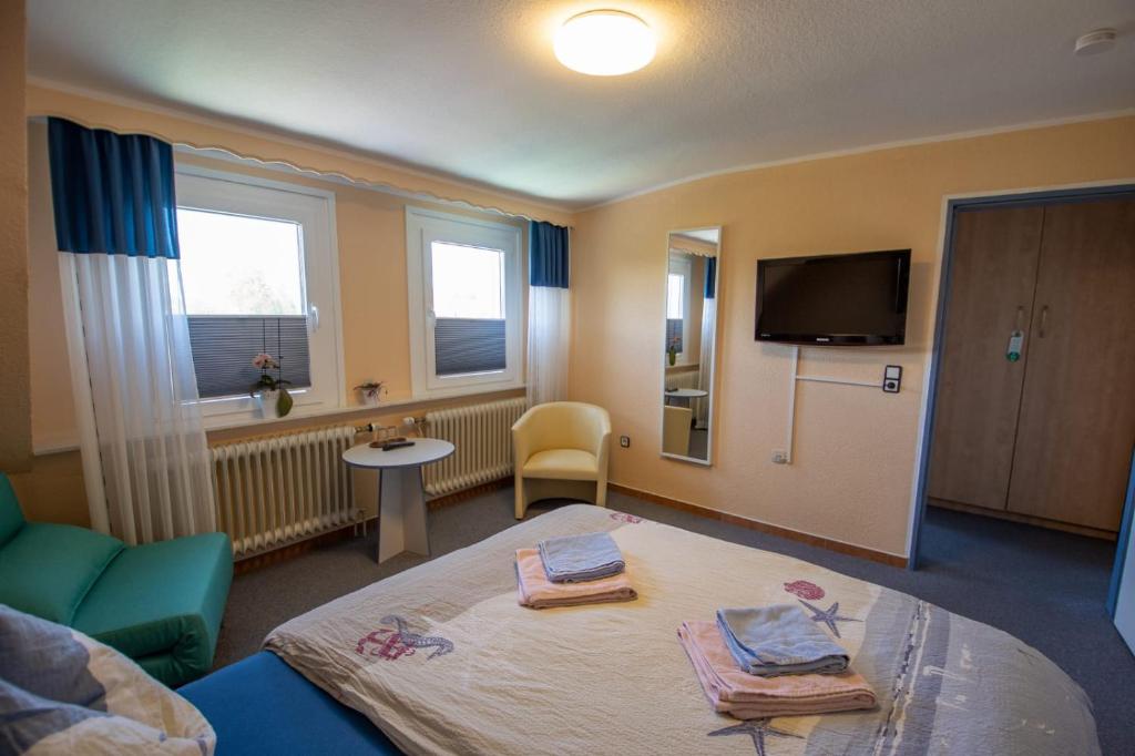 TV a/nebo společenská místnost v ubytování Hotel Norden Norddeich