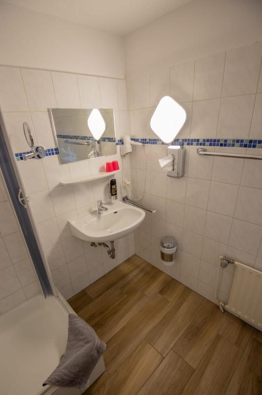 Koupelna v ubytování Hotel Norden Norddeich