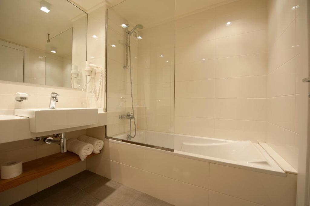 Koupelna v ubytování Hotel Cavalier