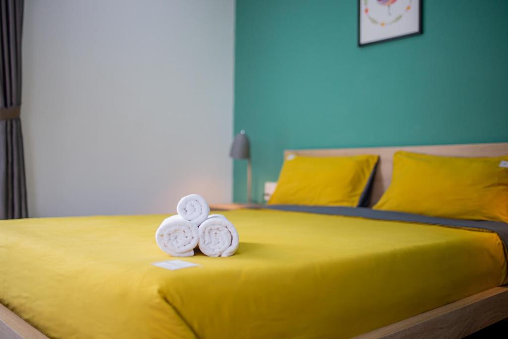Postel nebo postele na pokoji v ubytování Nami Home Da Nang