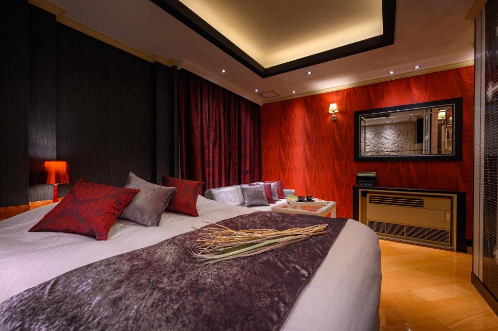 Postel nebo postele na pokoji v ubytování HOTEL C.KOHOKU