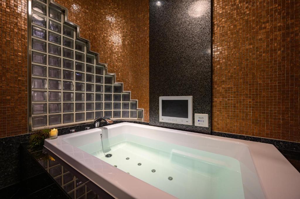 Koupelna v ubytování HOTEL C.KOHOKU