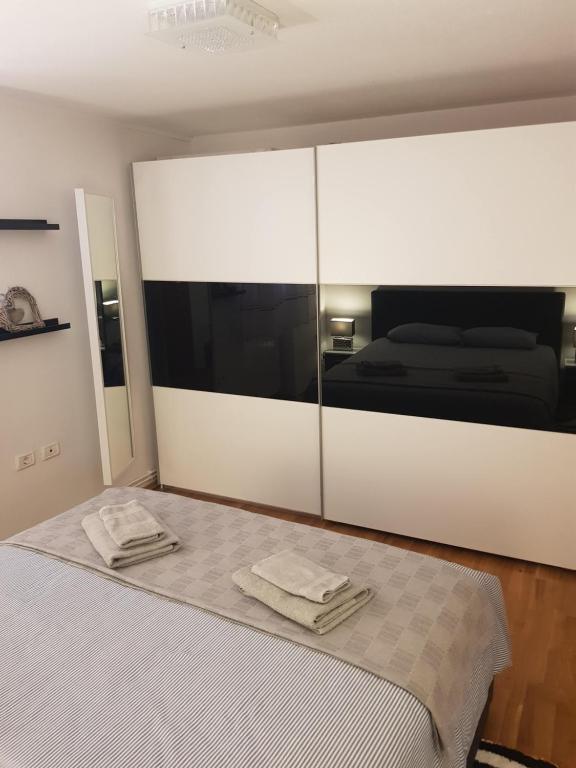 Postel nebo postele na pokoji v ubytování Apartment Prima