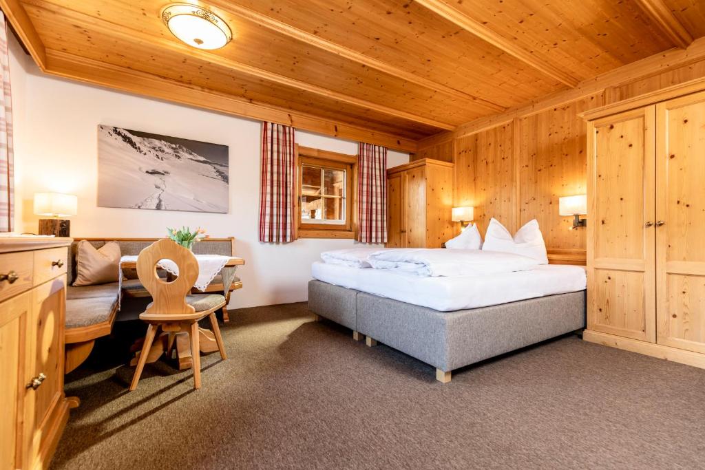 Postel nebo postele na pokoji v ubytování Gästehaus Gratlspitz