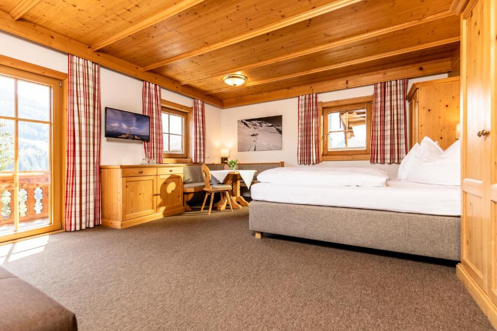 Postel nebo postele na pokoji v ubytování Gästehaus Gratlspitz