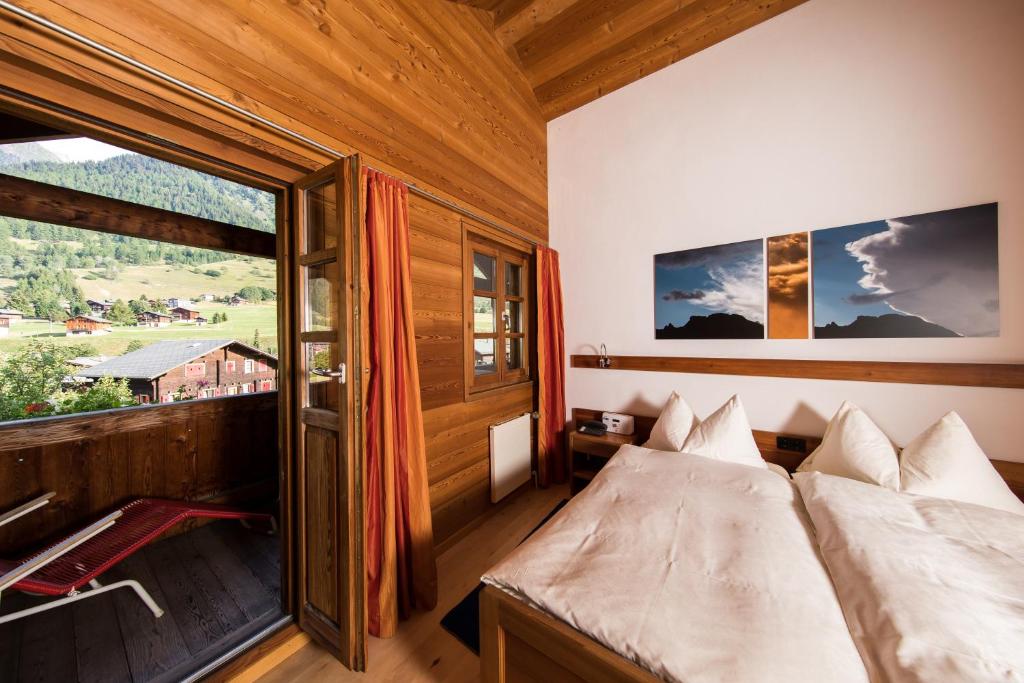 Postel nebo postele na pokoji v ubytování Hotel Glocke