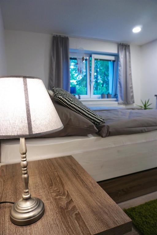 Postel nebo postele na pokoji v ubytování Apartmány U Lípy