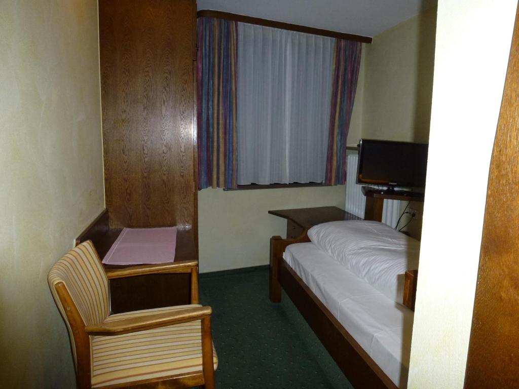 Postel nebo postele na pokoji v ubytování Gasthof Hotel Reif