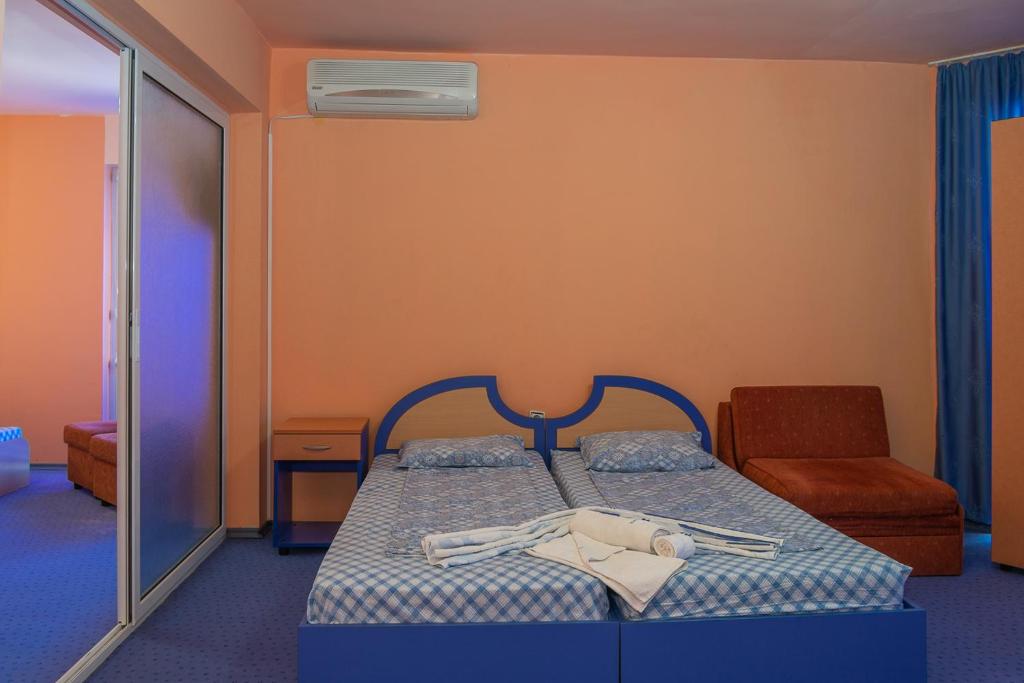 Postel nebo postele na pokoji v ubytování Dara Hotel