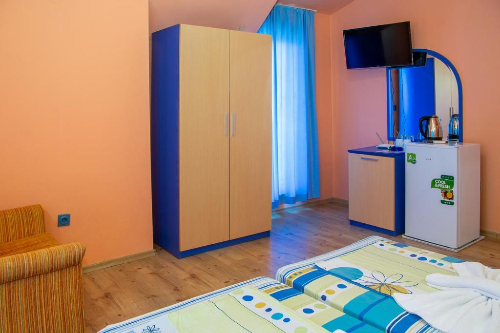 TV a/nebo společenská místnost v ubytování Dara Hotel
