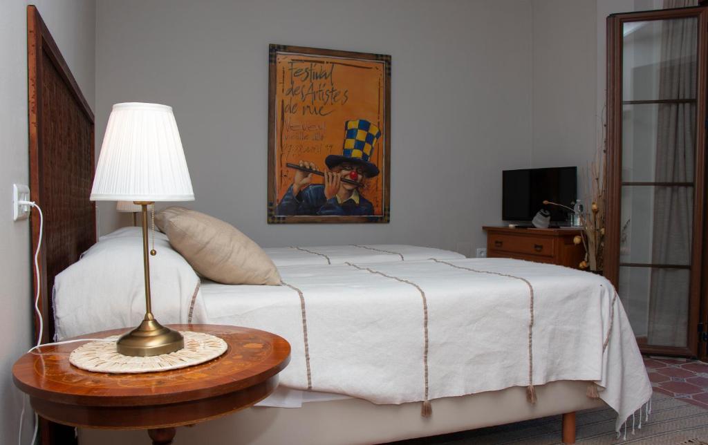 Postel nebo postele na pokoji v ubytování Hotel Cortijo de Salia