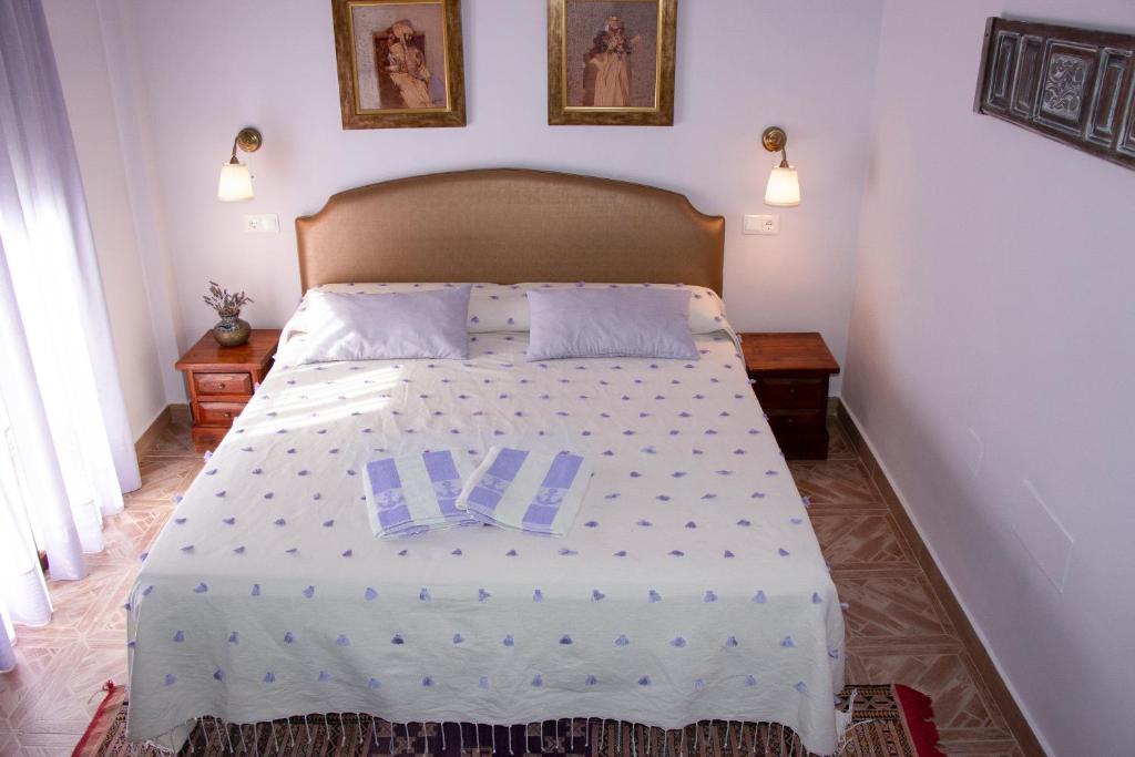Postel nebo postele na pokoji v ubytování Hotel Cortijo de Salia