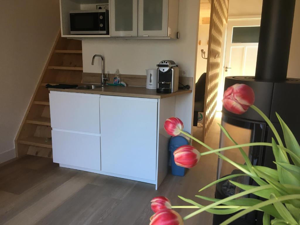 Kuchyň nebo kuchyňský kout v ubytování B&B Het Vogeltje