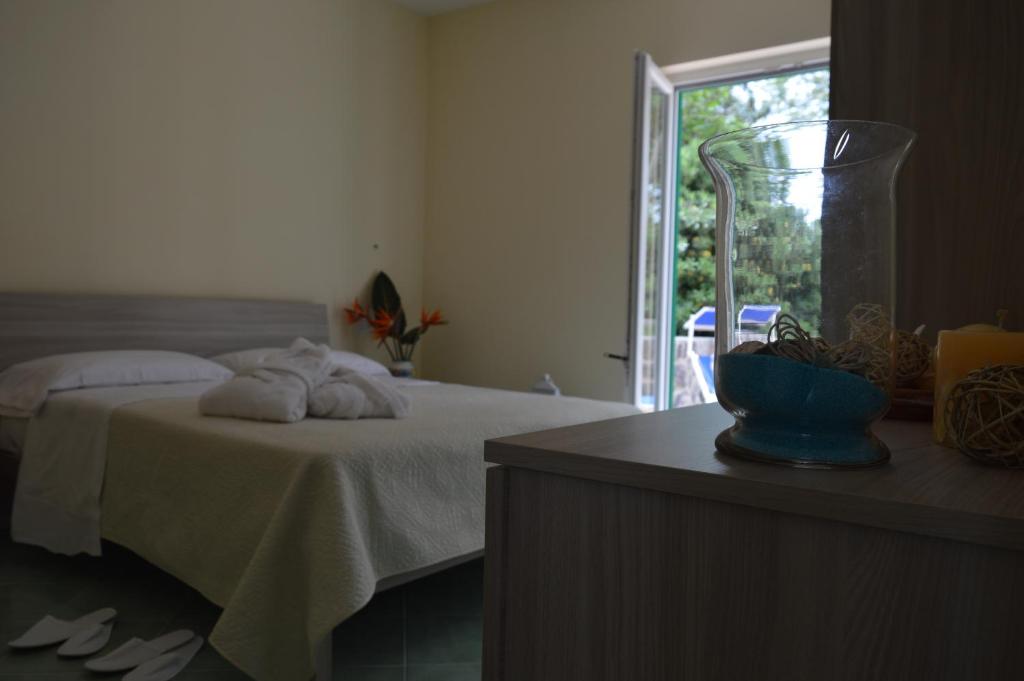 Łóżko lub łóżka w pokoju w obiekcie Hotel Terme Alexander