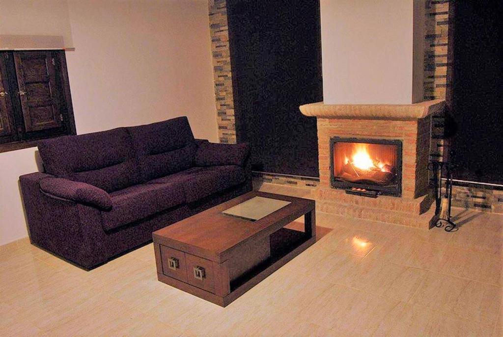 A seating area at Casas Rurales Villa Sem Sem