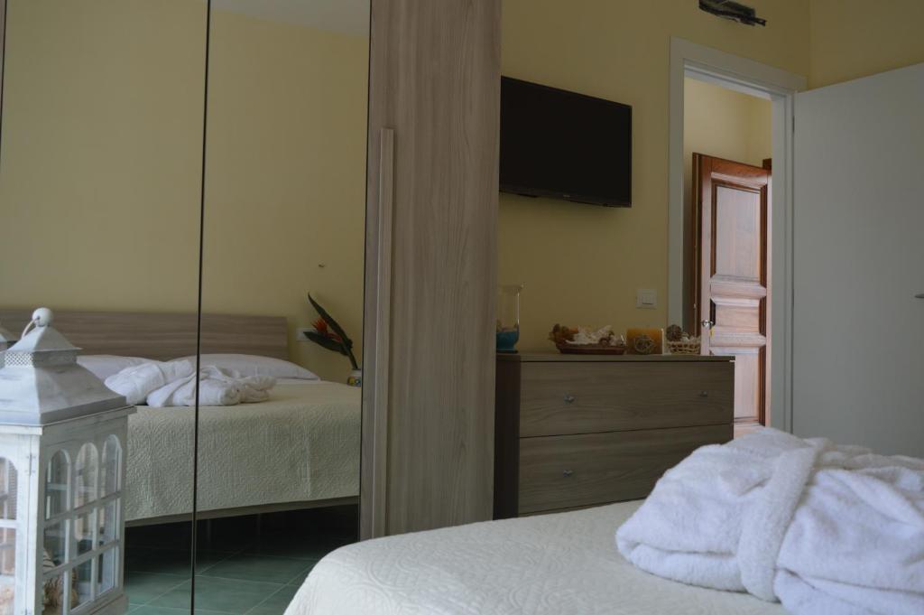 Łóżko lub łóżka w pokoju w obiekcie Hotel Terme Alexander