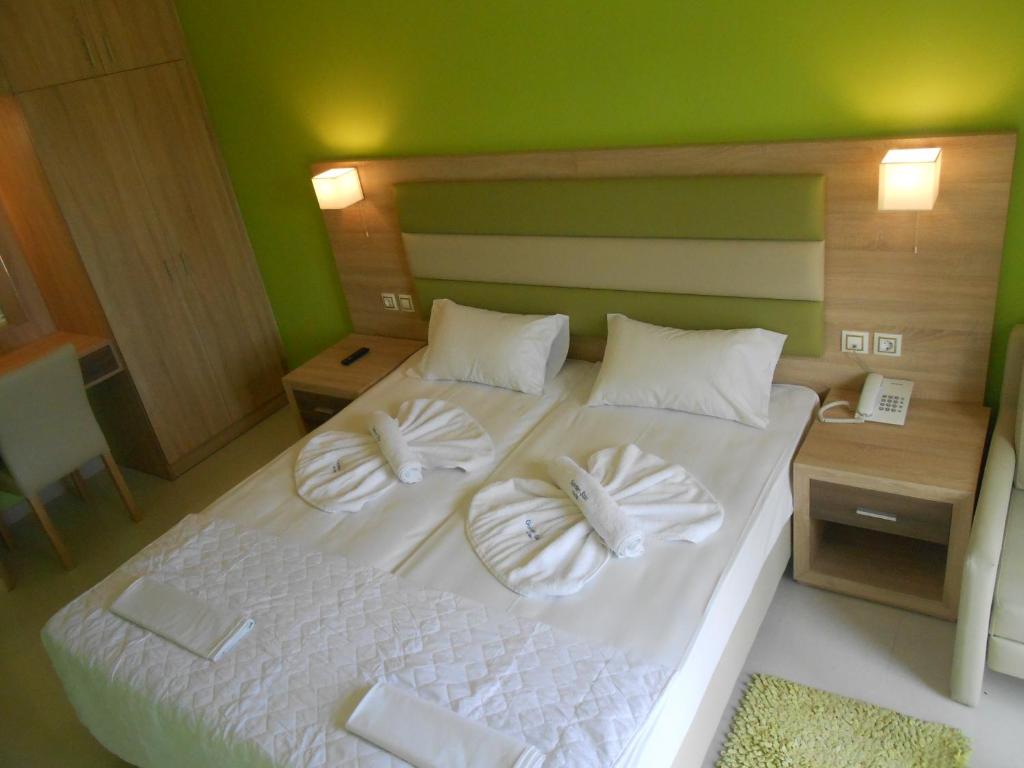 Postel nebo postele na pokoji v ubytování Golden Star