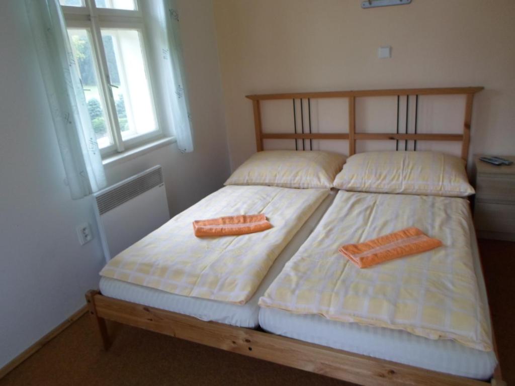 Postel nebo postele na pokoji v ubytování Vila Martin