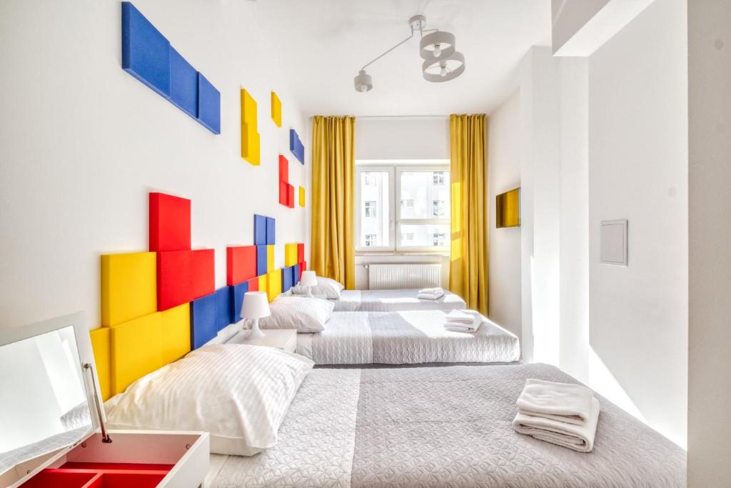 Postel nebo postele na pokoji v ubytování Level Rooms