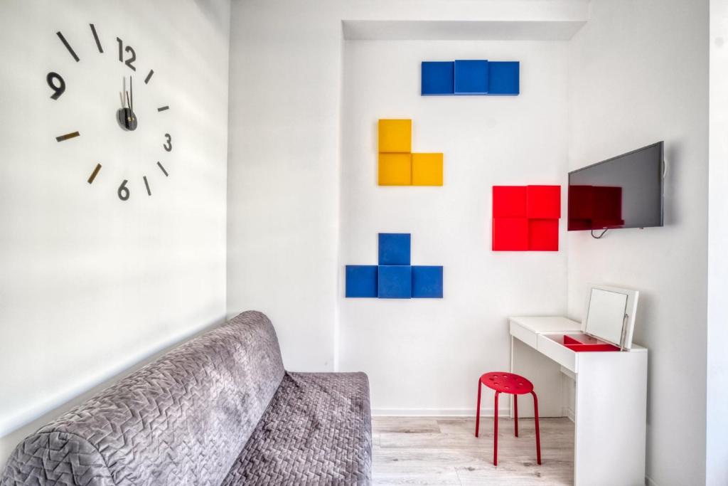 TV a/nebo společenská místnost v ubytování Level Rooms