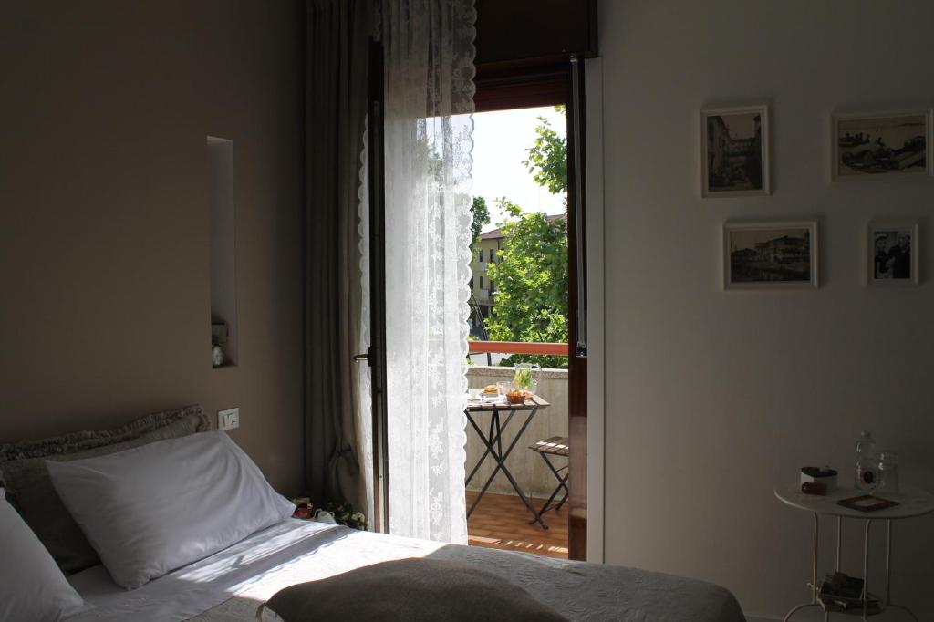 Postel nebo postele na pokoji v ubytování Un sogno B&B