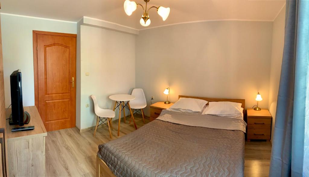 Posteľ alebo postele v izbe v ubytovaní Portowa 35