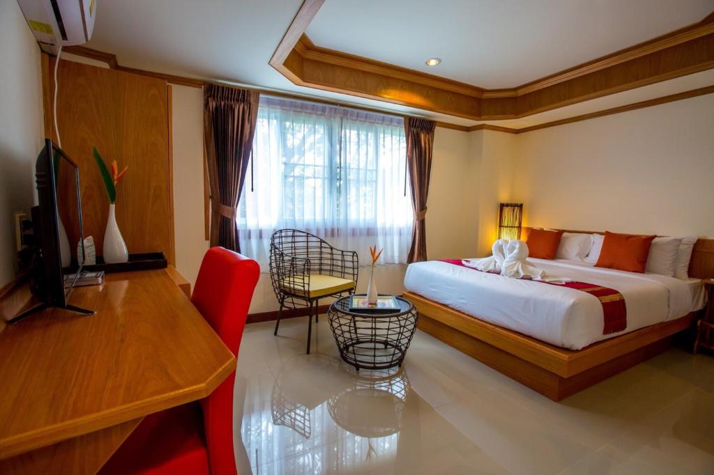 Postel nebo postele na pokoji v ubytování Phurua Inn ภูเรือ อินน์