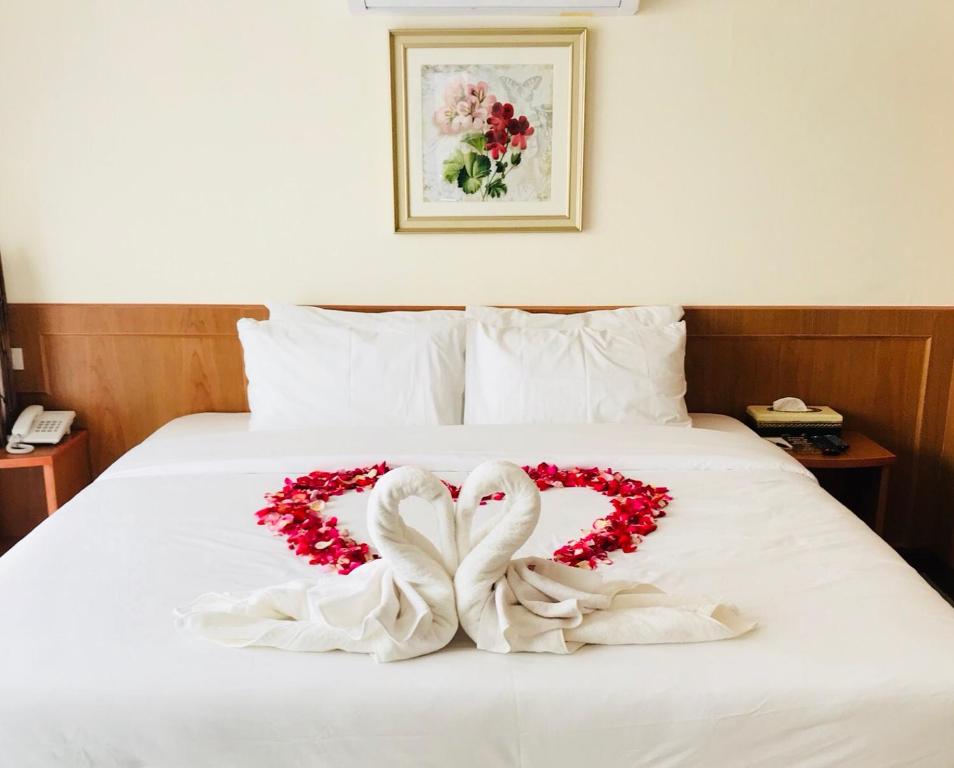 Postel nebo postele na pokoji v ubytování Phurua Inn ภูเรือ อินน์