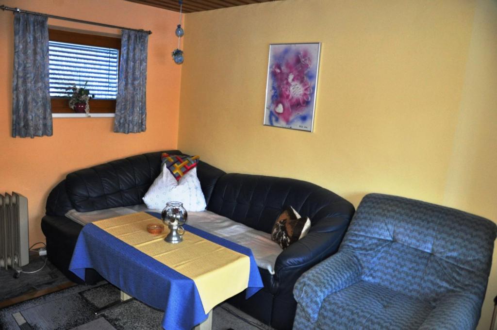 Posezení v ubytování Ferienhaus Backstuber