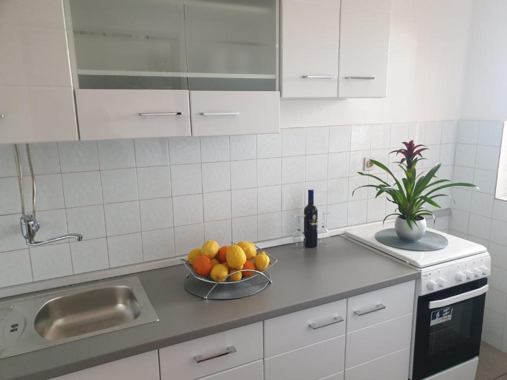 Kuchyňa alebo kuchynka v ubytovaní Apartments Kuzman