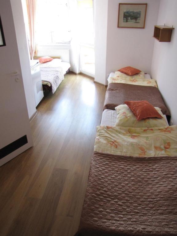 Postel nebo postele na pokoji v ubytování Zibi i Pod Topolami