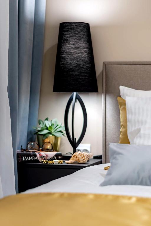 Posteľ alebo postele v izbe v ubytovaní Apartament Champagne Gdańsk