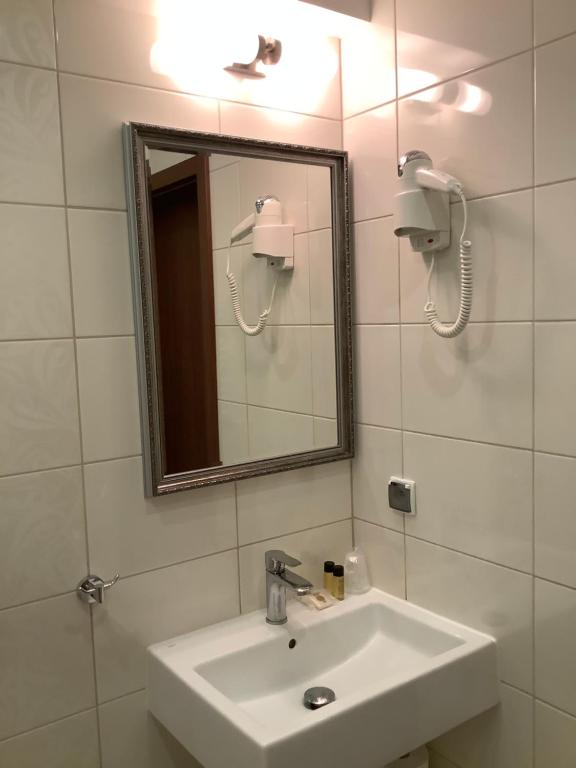 Koupelna v ubytování Amberia Mikołajki