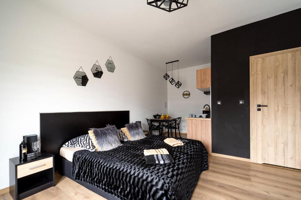 Posteľ alebo postele v izbe v ubytovaní Apartament Perła Pienin