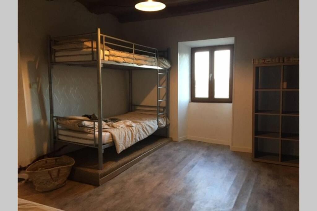 Postel nebo postele na pokoji v ubytování Gîte de La Sagne
