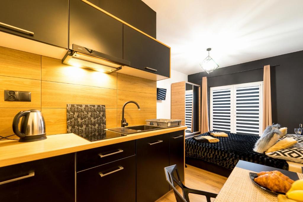 Kuchyňa alebo kuchynka v ubytovaní Apartament Perła Pienin