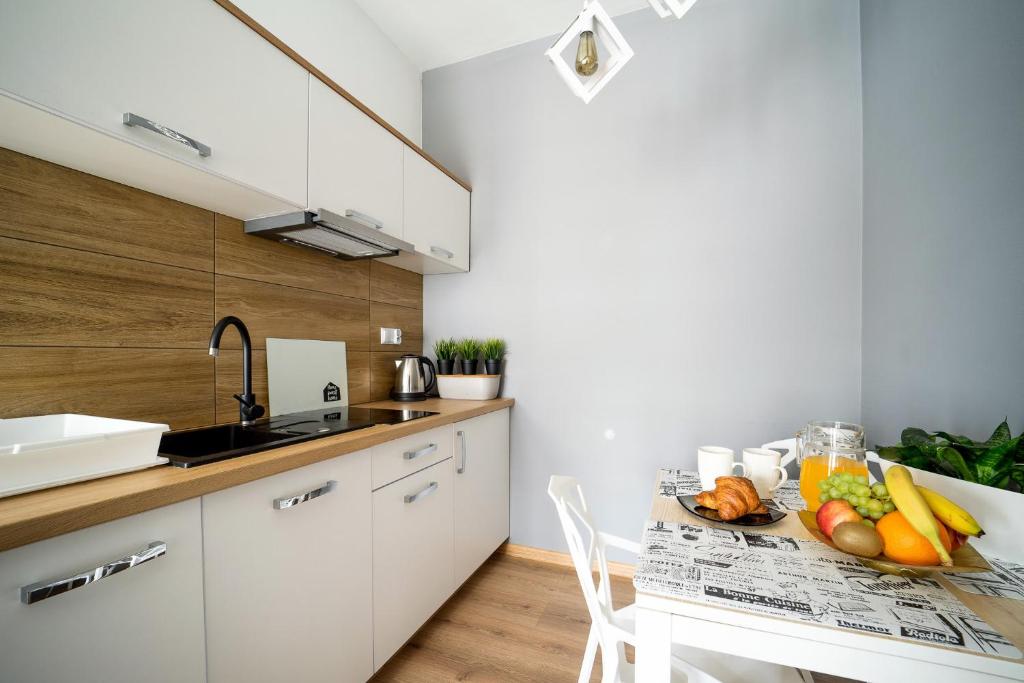 Kuchyňa alebo kuchynka v ubytovaní Apartament Perła Pienin