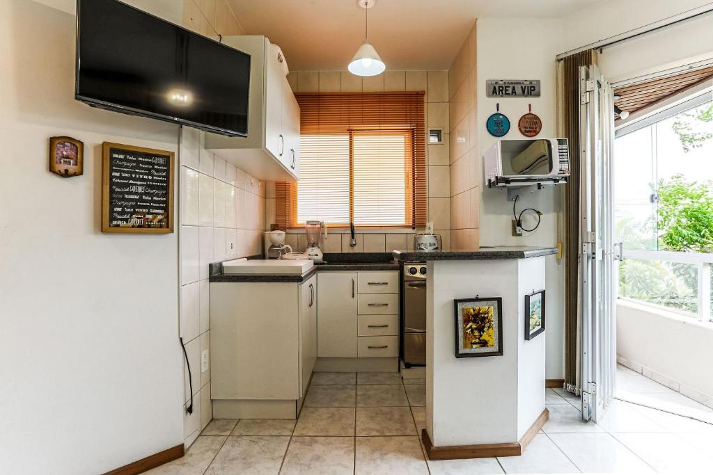  Apartamento em Jurerê moderno e completo. JA05