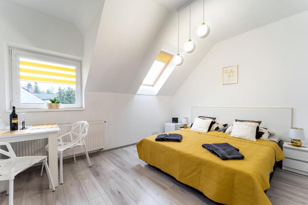 Posteľ alebo postele v izbe v ubytovaní Apartament Perła Pienin