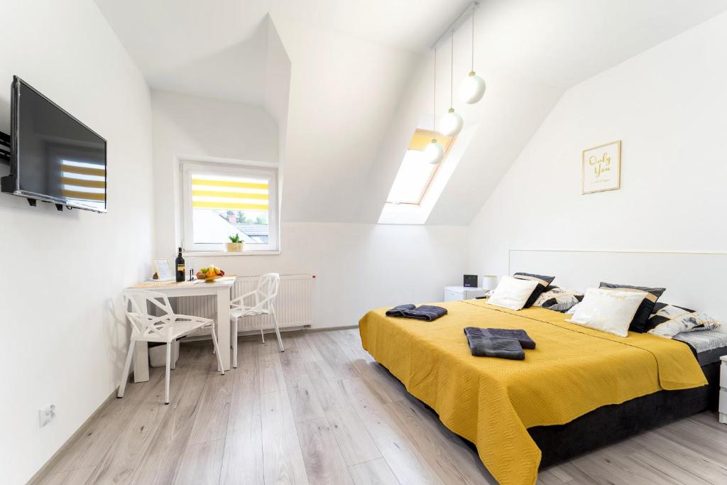 Posteľ alebo postele v izbe v ubytovaní Apartament Perła Pienin