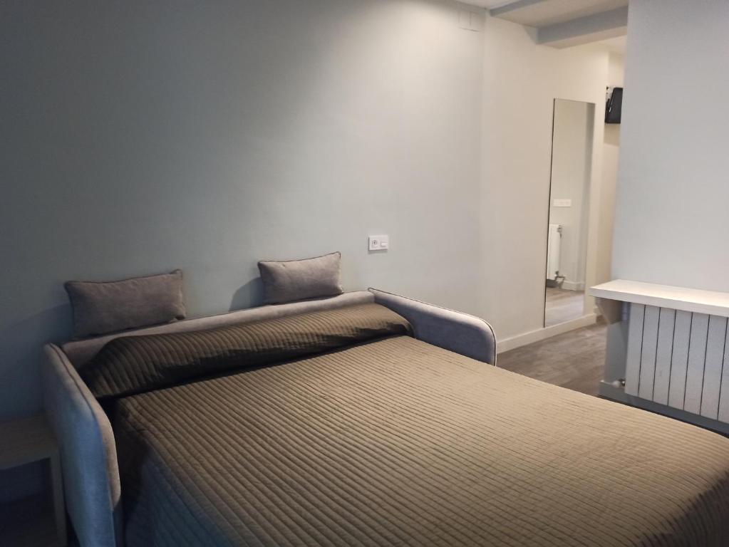 Postel nebo postele na pokoji v ubytování Bearan Bar & Rooms