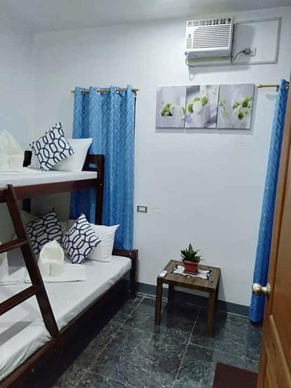 Postel nebo postele na pokoji v ubytování FilCan Hostel/Backpackers