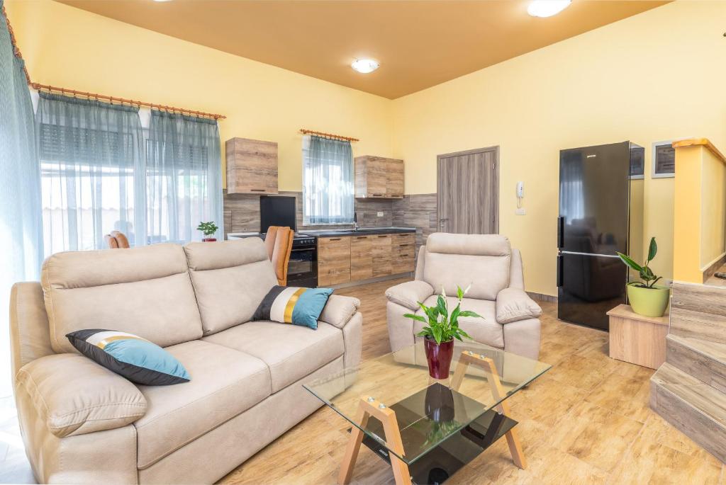 TV a/nebo společenská místnost v ubytování Apartmani Monte