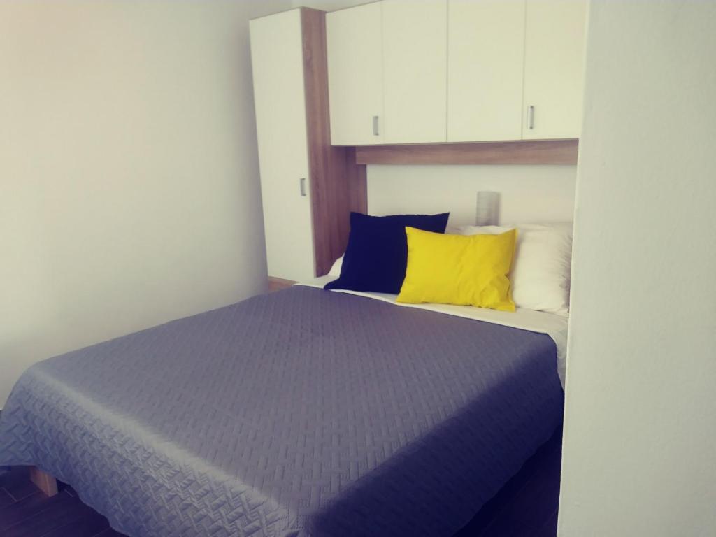Postel nebo postele na pokoji v ubytování Apartments Marina